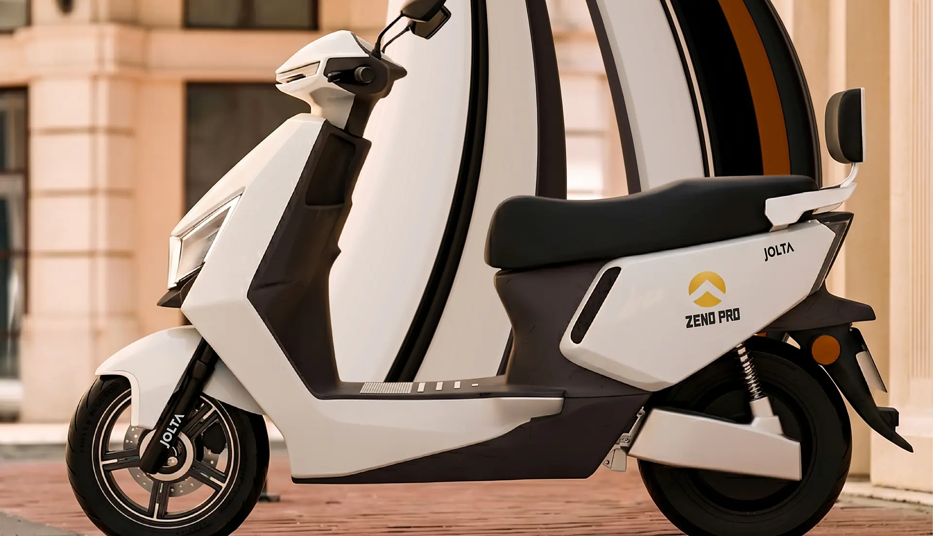 Jolta Zeno Pro electric scooty in white on a brick street, under a sweeping striped arch